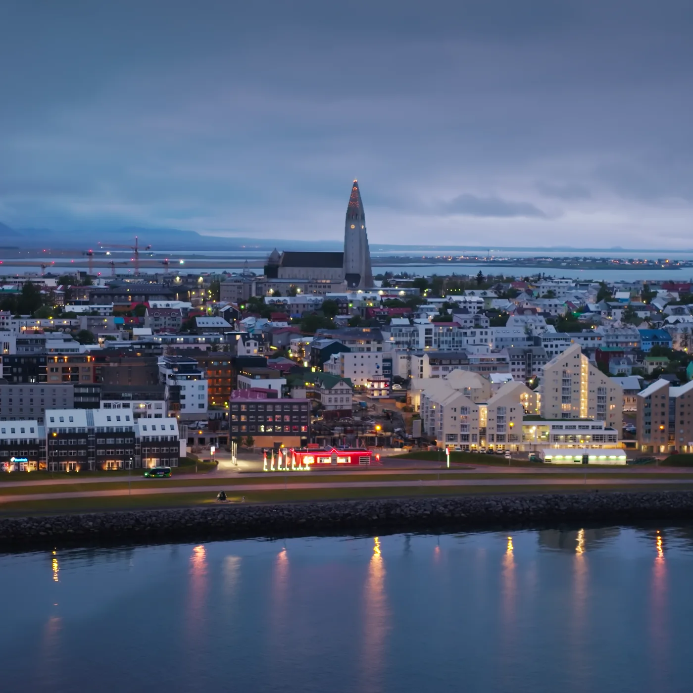Reykjavík at dusk, Hallgrímskirkja rising above the harbor